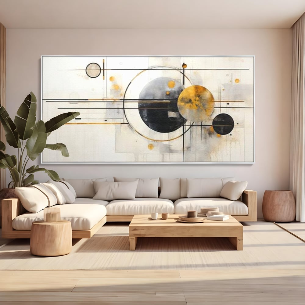 Tablou canvas cu pictura abstracta cu forme geometrice, in rama de aluminiu argintiu, pe perete intr-un living